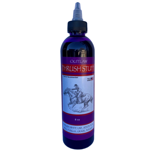 Bottle of Outlaw Thrush Stuff on a white background